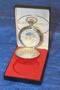 lot 72 image: COLIBRI QUARTZ POCKET WATCH IN CASE&nbsp