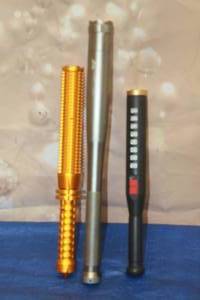 lot 87 image: ORANGE TELESCOPIC BATON SELF DEFENSE LED FLASHLIGHT , OZARK TRAIL MULTI FUNCTION LED FLASHLIGHT , BASEBALL SHAPE SELF DEFENSE LED RECHARGEABLE FLASHLIGHT  SEE PICS&nbsp