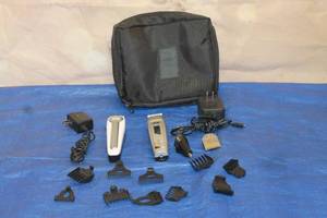 lot 97 image: TOTAL OF 2&nbsp CORDLESS TRIMMERS - CONAIR GMT7058 &amp WAHL 5612 WITH LOT OF&nbsp ATTACHMENT COMBS&nbsp