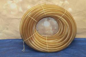 lot 112 image: ROLL OF LONG FLEXIBLE TYGON TUBE HOSE TUBING&nbsp