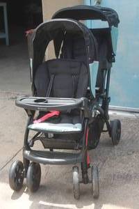 lot 139 image: BABYTRENS SIT N STAND DOUBLE SEAT STROLLER