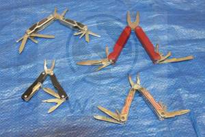 lot 30 image: TOTAL OF 4 MULTI TOOL FOLDING KNIVES  SEE PICS&nbsp