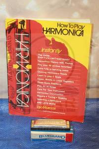 lot 41 image: BLUESBAND HARMONICA IN ORIGINAL BOX WITH HOW TO PLAY HARMONICA BOOK&nbsp