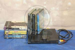 lot 72 image: LG DVD PLAYER DP132&nbsp WITH REMOTE&nbsp &amp 10 ASSORTED DVDS&nbsp