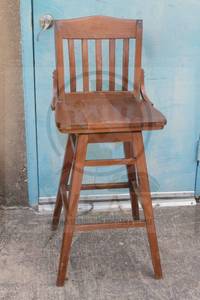 lot 200 image: WOODEN SWIVEL BAR STOOL