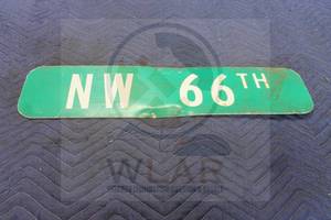 lot 232 image: DOUBLE SIDED METAL STREET SIGN  NW 66TH&nbsp 24L&nbsp
