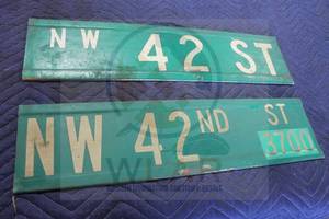 lot 233 image: TOTAL OF 2 DOUBLE SIDED METAL STREET SIGN  42ND ST , 24 12L&nbsp