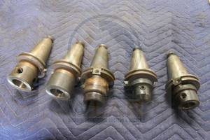 lot 239 image: TOTAL OF 5 ASSORTED SIZE CAT50&nbsp END MILLS&nbsp TAPER TOOL HOLDERS  SEE PICS