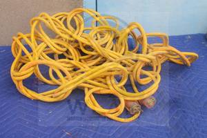 lot 125 image: YELLOW HEAVY DUTY LONG EXTENSION CORD&nbsp