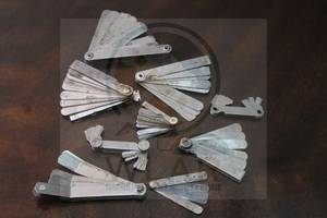 lot 10 image: TOTAL OF 9- ASSORTED BRAND METAL BLADE FEELER GAUGE METRIC TOOL  SEE PICS&nbsp