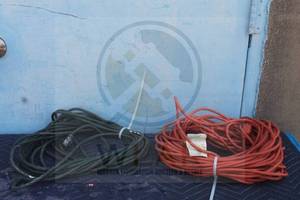 lot 25 image: TOTAL OF 2 LONG EXTENSION CORDS ,&nbsp GREEN 50FT&nbsp &amp ORANGE 100FT&nbsp