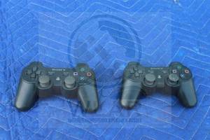 lot 13 image: TOTAL OF 2 SONY DUAL SHOCK3 WIRELESS CONTROLLERS&nbsp