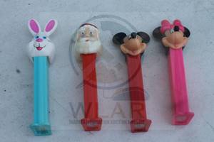 lot 153 image: TOTAL OF 4 VINTAGE PEEZ DISPENSERS , SANTA CLAUS , EASTER RABBIT, MICKIE &amp MINNIE&nbsp