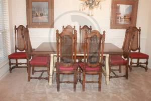 lot 16 image: VINTAGE SOLID WOOD DINING TABLE WITH 8-FRENCH LOUIS XIII STYLE MAHOGANY CARVED BARLEY TWIST CANE BACK DINING CHAIRS (2) ARE&nbsp ARM CHAIRS  SEE PICS&nbsp