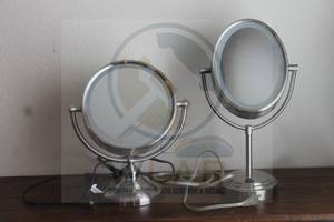 lot 50 image: TOTAL OF 2 CONAIR LIGHTED MAKEUP DOUBLE SIDED MAGNIFICATION LED ILLUMINATION VANITY MIRRORS&nbsp BE121 &amp BE47SNT
