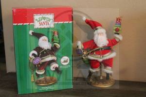 lot 66 image: LEAPING SANTA DANCING SANTA LESS DASHING MORE DANCING  J502 IN ORIGINAL BOX&nbsp