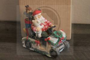 lot 75 image: SANTA&nbsp DRIVING GOLF CART 7H&nbsp STATUE&nbsp MUSICAL&nbsp BOX&nbsp&nbsp