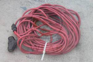 lot 129 image: HEAVY DUTY LONG RED 3-PRONG OUTLET EXTENSION CORD&nbsp
