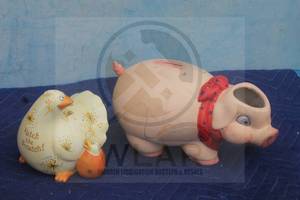lot 75 image: TOTAL OF 2 VINTAGE PIGGY BANKS ,- LARGE MCM CERAMIC PIG PIGGY BANK WITH RED BLUE DOT BOW &amp FITZ AND FLOYD HATCH THE SCRATCH&nbsp