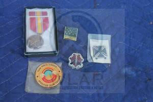 lot 176 image: 5 METALS. TASK FORCE LIBERTY RAINBOW OPERATION IRAQ FREEDOM, 1973 NATIONAL DEFENSE, WELCOME HOME HERO AND VICTORIA EX SCIENLIA BADGE BASIC DSA-100-71-C-0723