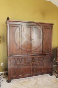 lot 8 image: LANE SOLID&nbsp CHEERY WOOD CONTEMPORARY TRADITIONAL STYLE CARVED COLLUMNS WIDE&nbsp ENTERTAINMENT CENTER WIDE ARMOIRE FURNITURE&nbsp WITH PANEL DOORS AND BOTTOM CABINET , 75H X64 TELEVISION NOT INCLUDED BRING EXTRA HELP &amp HAND TRUCK DOLLY&nbsp