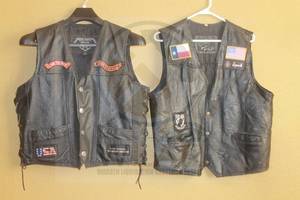 lot 95 image: TOTAL OF 2 BLACK GENUINE BLACK LEATHER MOTORCYCLE VEST SIZE LARGE  SEE PICS&nbsp