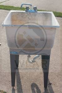 lot 111 image: E.L MUSTEE &amp SON&nbsp HEAVY DUTY UTILATUB FLOOR -MOUNT ECONOMY LAUNDRY UTILITY TUB&nbsp WITH PLUMBING&nbsp
