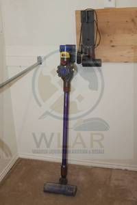 lot 143 image: DYSON V8 ANIMAL&nbsp CORDLESS VACUUM WITH WALL MOUNT&nbsp CHARGING STATION AND THREE&nbsp VACUUM ATTATCHMENTS  SEE PICS&nbsp