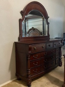 lot 72 image: SOLID CHERRY WOOD 12-DRAWER DRESSER WITH MIRROR MADE IN VIETNAM , MATCH # 73  SEE PICS  BRING EXTRA HELP REMOVING ITEM SEE VIDEO ATTACHED