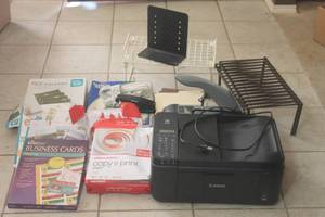 lot 287 image: CANON MX492 PRINTER WITH LOT OF ASSORTED OFFICE SUPPLIES , BUSINESS CARDS,COPY &amp PRINTER PAPER, CABINET STORAGE SHELVES,FILE FOLDERS,BOOKENDS,PHOTO PAPER AND SWINGLINE 415 STAPLER&nbsp  SEE PICS&nbsp