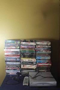 lot 292 image: APEX AD-110 DVD PLAYER &amp REMOTE WITH GENEROUS AMOUNT OF DVDS IN CASE&nbsp