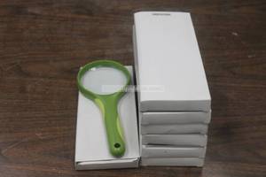 lot 54 image: TOTAL OF 7 GREEN MAGNIFYING GLASS