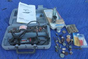 lot 26 image: DREMEL MULTI PRO VARIABLE SPEED ROTARY TOOL 395 WITH DREMEL CIRCLE CUTTER AND STRAIGHT EDGE GUIDE &amp COLLECTION OF DREMEL TOOL ACCESSORIES IN STORAGE CASE&nbsp  SEE PICS&nbsp