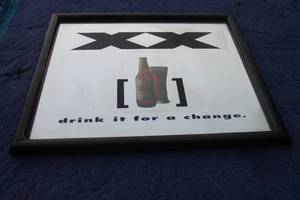 lot 57 image: VINTAGE 1993 DOS EQUIS XX BEER&nbsp DRINK IT FOR A CHANGE FRAMED MIRROR MAN CAVE&nbsp SIGN 18 H X 21 W&nbsp