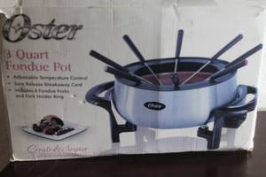 lot 106 image: OSTER 3-QUART FONDUE POT FPSTFN7700-WB IN ORIGINAL BOX&nbsp