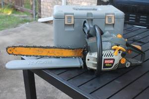 lot 116 image: RYOBI 40CC SAW WITH EXTRA SAW BLADE AND CARRY STOTAGE CASE&nbsp