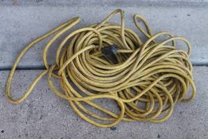 lot 157 image: YELLOW EXTRA LONG HEAVY DUTY EXTENSION CORD&nbsp
