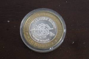 lot 180 image: TREASURE ISLAND AT THE MIRAGE LAS VEGAS NV LIMITED EDITION TEN DOLLAR GAMING TOKEN , .999 FINE SILVER&nbsp