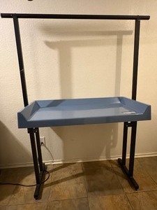 lot 144 image: LAUNDROMAT FOLDING GARMENT TABLE FULL LENGTH RACKS , 5FT W X 6 FT H&nbsp