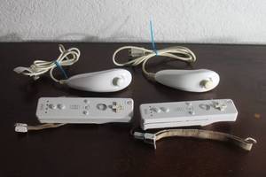 lot 67 image: TWO SET OR NINTENDO WII REMOTE CONTROLLERS AND NUNCHUK ATTACHMENTS&nbsp