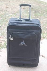 lot 30 image: OFFICIAL WALT DISNEY WORLD BLACK 28 CHECK ON ROLLING LUGGAGE SUITCASE&nbsp
