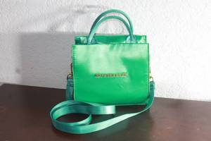 lot 62 image: BRANDON BLACKWOOD NEW YORK END SYSTEMIC RACISM&nbsp SATIN GREEN&nbsp TOTE PURSE , 7 W X 6 12 H&nbsp