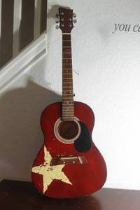 lot 82 image: FIRST ACT ACOUSTIC GUITAR , MG373&nbsp
