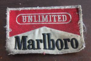 lot 115 image: VINTAGE MARLBORO UNLIMITED CIGARETTES EMBROIDERED PATCH , 4&nbsp