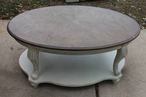 lot 131 image: OVAL&nbsp 2-TIER COFFEE TABLE WITH AN ANTIQUED TWO TONE&nbsp &nbspWHITE DISTRESSED WOOD FINISH&nbsp&nbsp