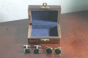 lot 47 image: GOLD TONE &amp BLACK&nbsp &nbsp &nbsp &nbspSILVER TONE &amp BLACK&nbsp SET OF CUFF LINKS IN WOOD STORAGE CASE&nbsp
