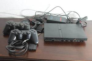 lot 4 image: SONY PLAYSTATION 2 SLIM GAME CONSOLE SCPH-75001 WITH 2- PLAYSTATION 2 WIRED&nbsp CONTROLLERS&nbsp