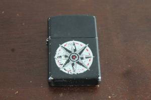 lot 31 image: VINTAGE ZIPPO MARLBORO BLACK COMPASS LIGHTER&nbsp