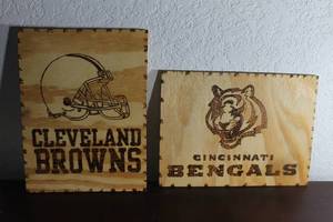 lot 89 image: TOTAL OF 2 NFL&nbsp MAN CAVE WOODEN&nbsp &nbsp12 X 9 WALL PLAQUES - CLEVELAND BROWNS CINCINNATI BENGALS&nbsp