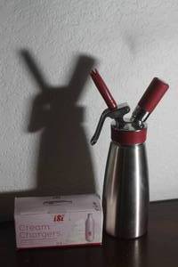 lot 139 image: ISI GOURMET WHIP CULINARY &amp CREAM WHIPPER WITH SEALED BOX OF ISI CREAM CHARGERS&nbsp